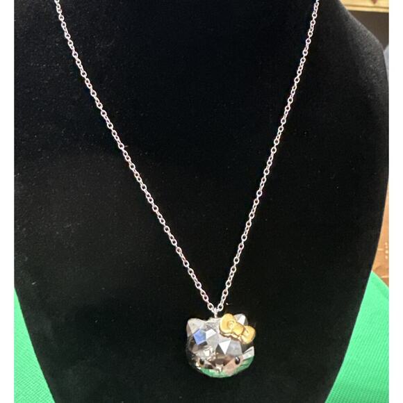 SWAROVSKI SANRIO HELLO KITTY CRYSTAL FACE JET GOLD RIBBON NECKLACE - Picture 2 of 13